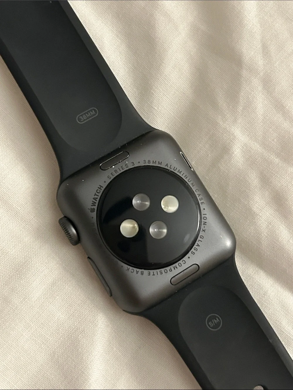 Apple Black Smartwatch with White Magnetic Charger